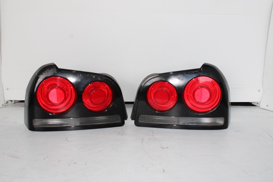JDM 1998-2005 NISSAN SKYLINE R34 GTT 4 DOOR OEM PAIR OF TAIL LIGHTS